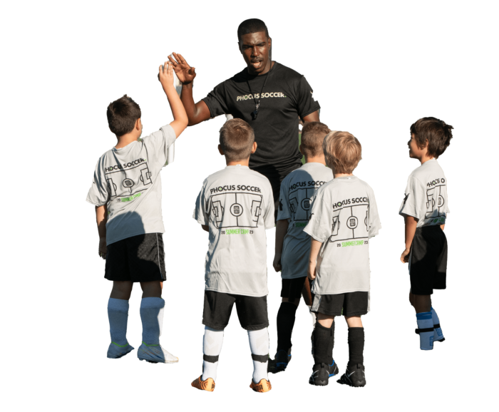 Phocus Soccer trainer Dencho teaching kids